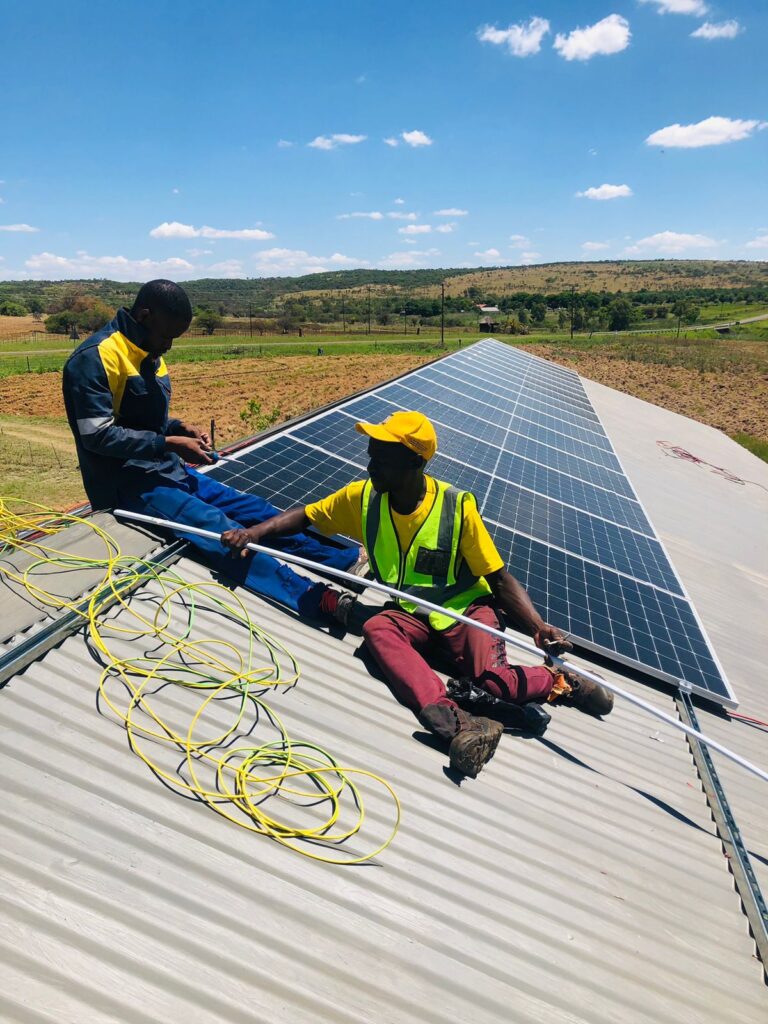 Aquarius team installing Solar